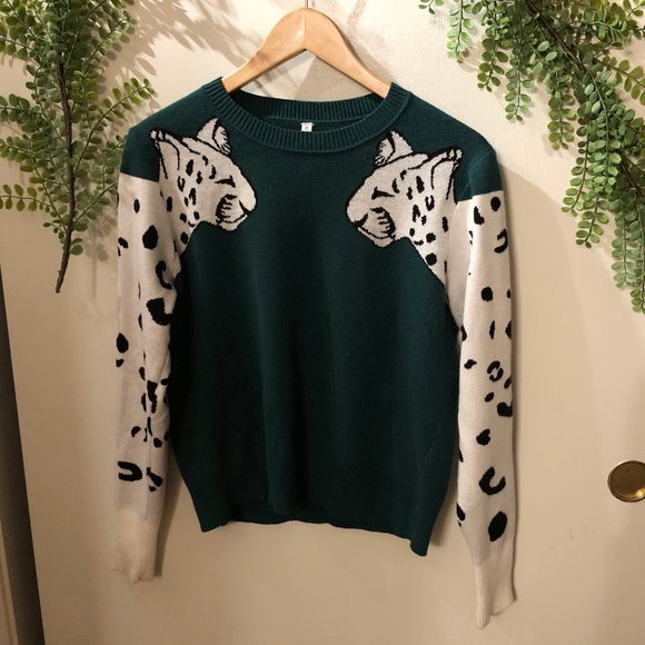 Turquoise Sweater White Jaguar Sleeves 